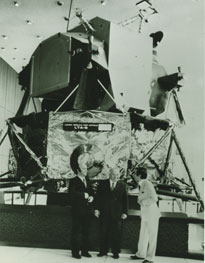  Tullio Campagnolo in front of NASA satellite OSO 6.