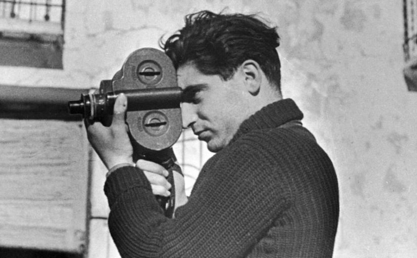 Robert Capa with a camera