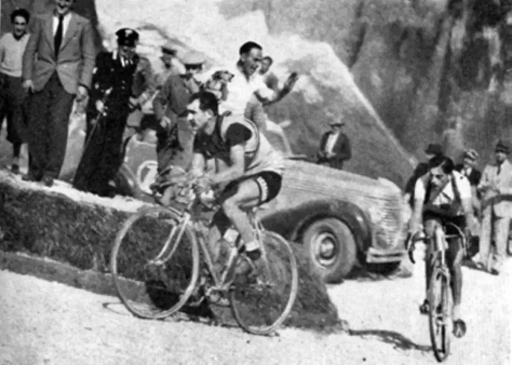 Gino Bartali leading Fausto Coppi on a climb at stage 17 of Giro d'Italia 1940.