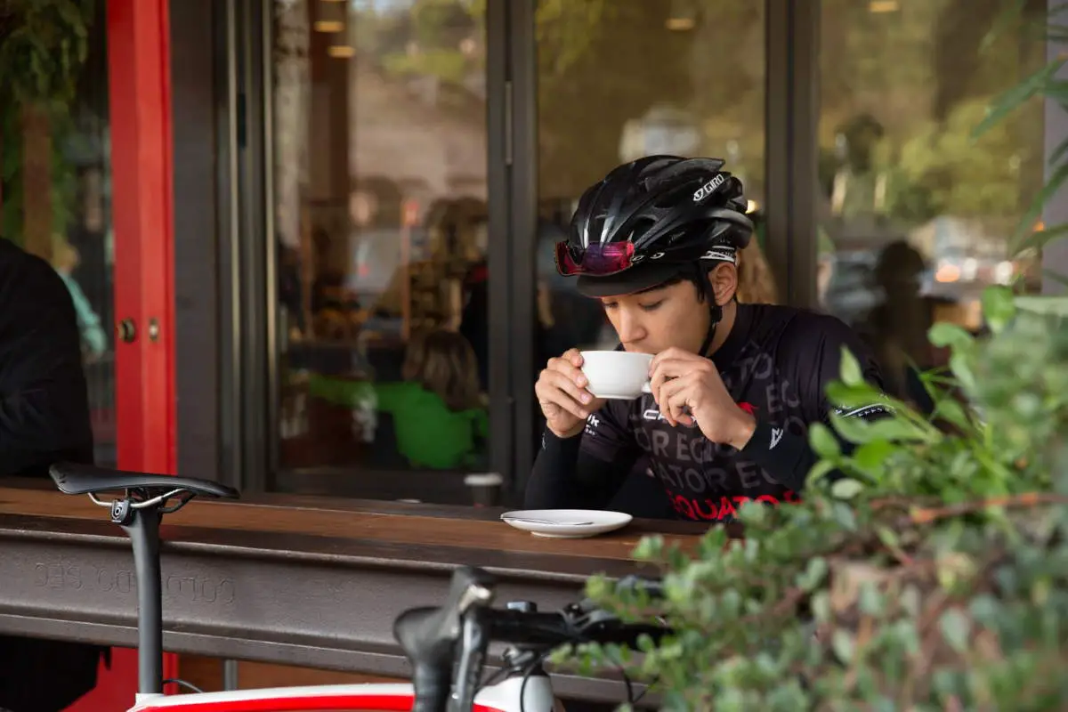 Cyclist drinking coffee