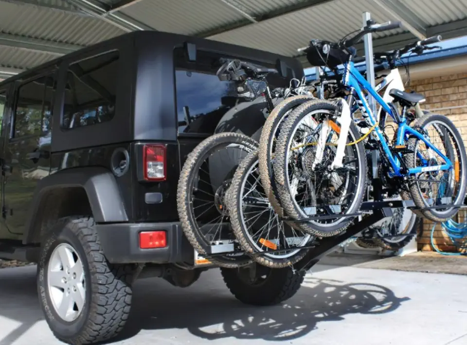 Jeep Wrangler and mountain bikes on bike rack