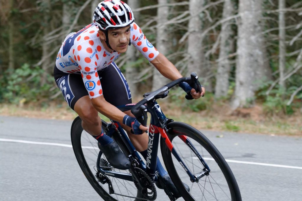 Richard Carapaz wearing the King of the Mountains' polka dot jersey at the 2020 Tour de France.