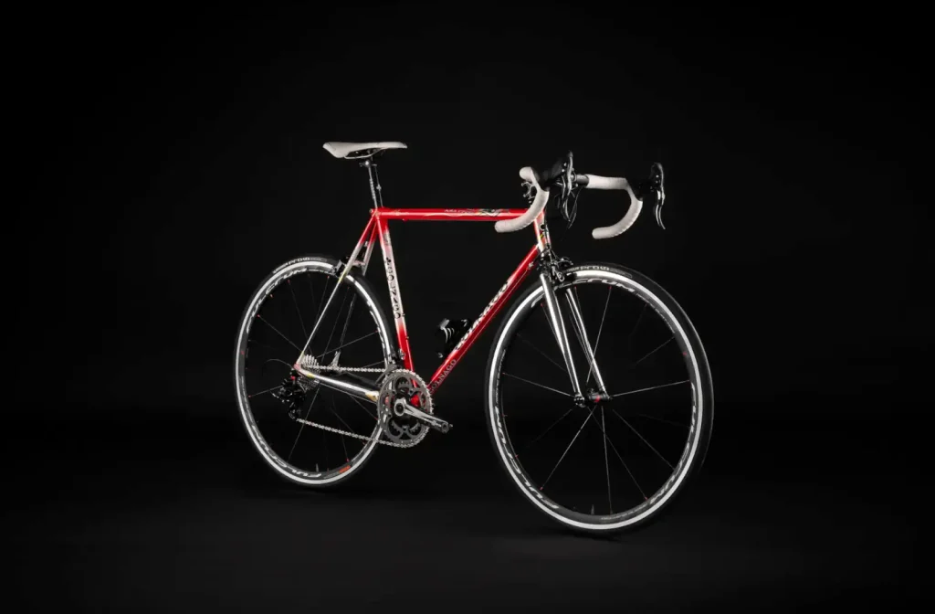 Colnago Master 2026 in Saronni Red with the distinctive straight-bladed Colnago Precisa steel fork