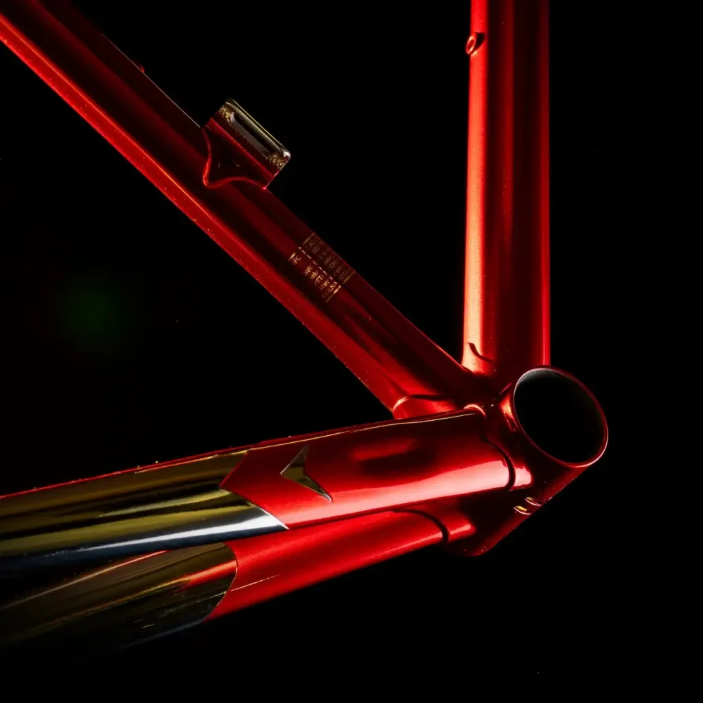 Close-up of a Colnago Master steel frame showing its distinctive S4 star-shaped tubing around the bottom bracket.
